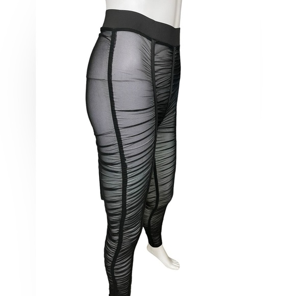 Black Mesh Sheer Leggings
New - Picture 7 of 9